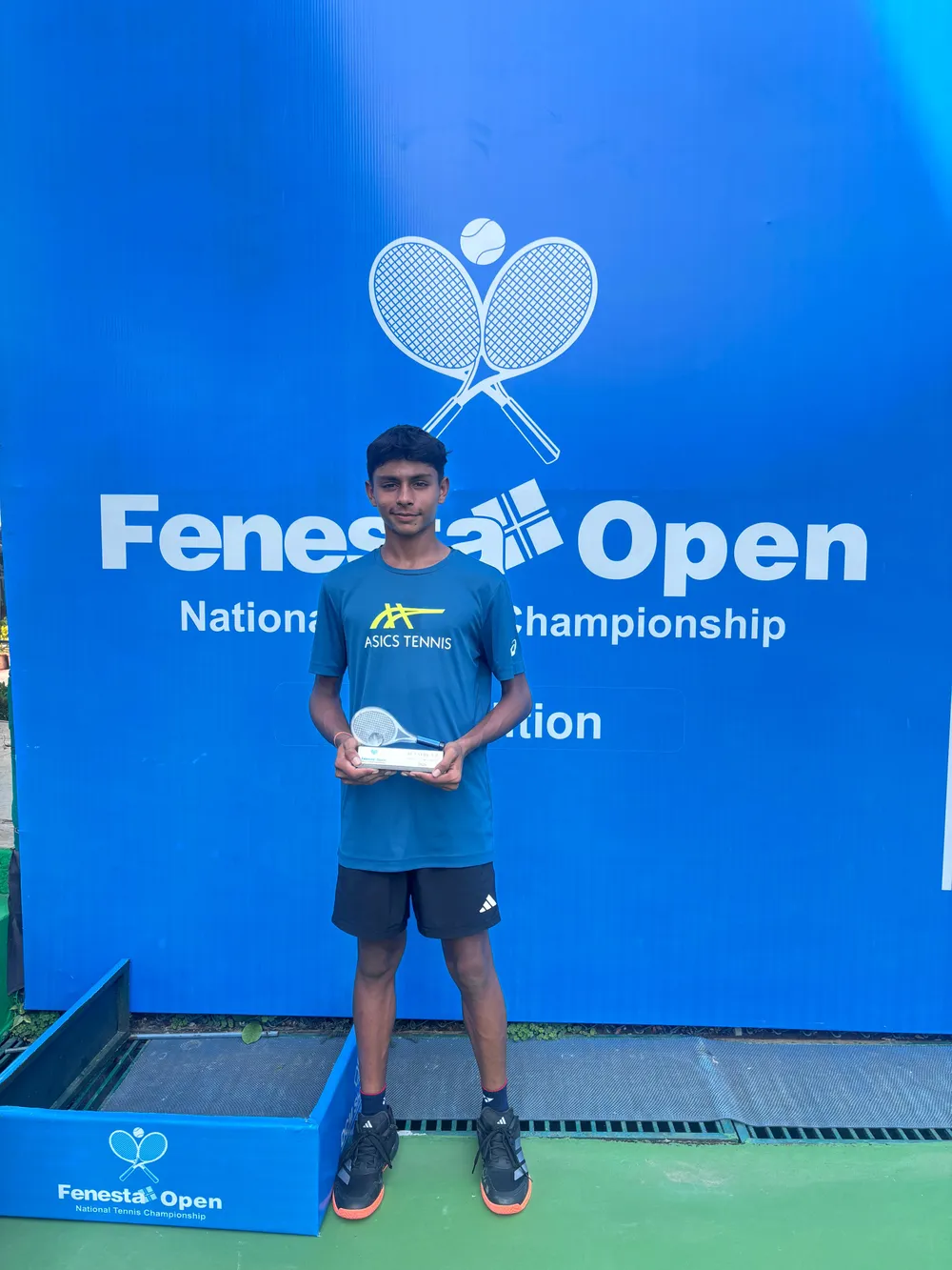 Sparsh with his runner-up trophy in the doubles category at the Fenesta Nationals U-14 Tennis Tournament, Delhi
