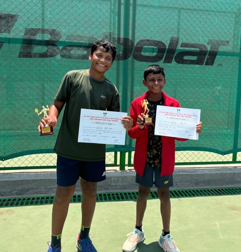 Sparsh showing his trophy for 1st place in the doubles category and 2nd place in singles in the under 12 group at the Mumbai University Championship Series (CS7) - Kalina