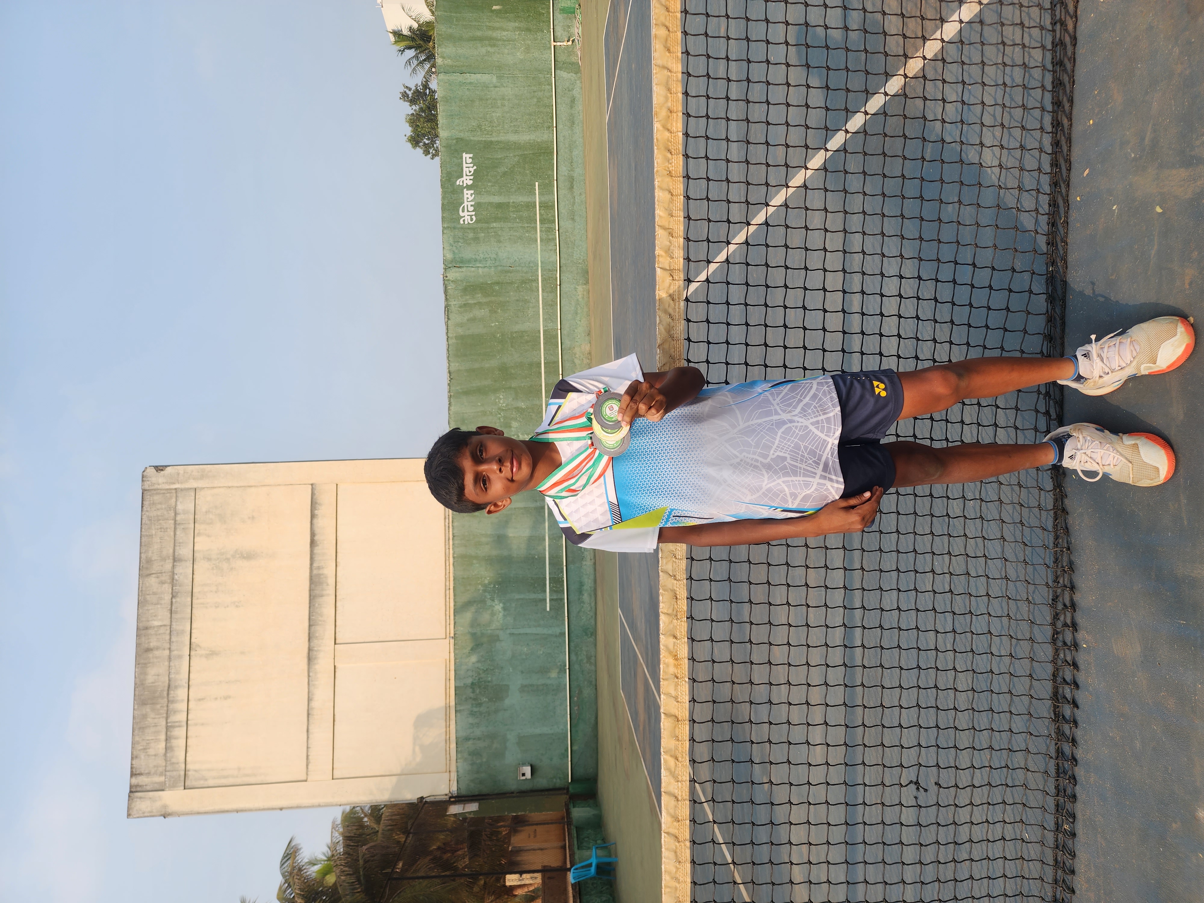 Sparsh receiving the trophy for winner in the doubles category, runner up in the singles cateogry and runner up in the team events category at the Under 15 Mumbai Soft Tennis National Selection - Satara