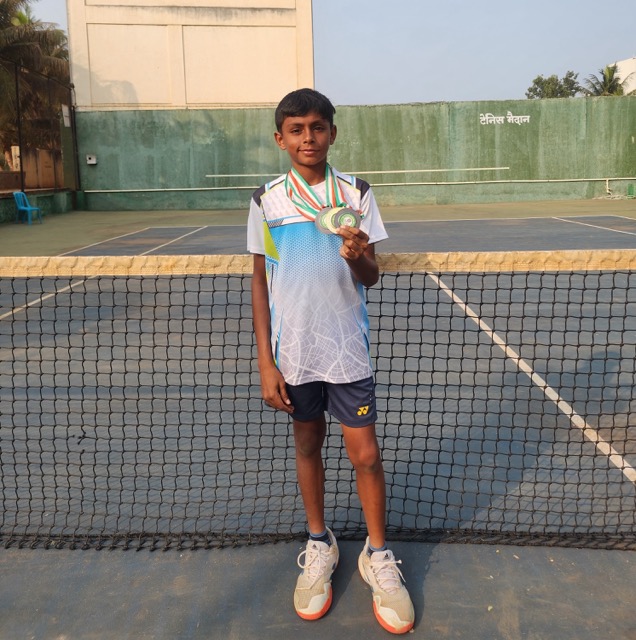 Sparsh receiving the trophy for winner in the doubles category, runner up in the singles cateogry and runner up in the team events category at the Under 15 Mumbai Soft Tennis National Selection - Satara