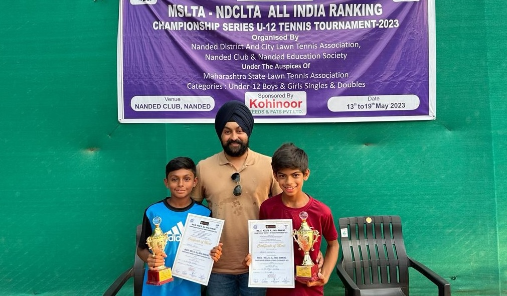 Sparsh collecting trophy for winning in the Singles category at the Under 12 Pronext Sports Academy Championship