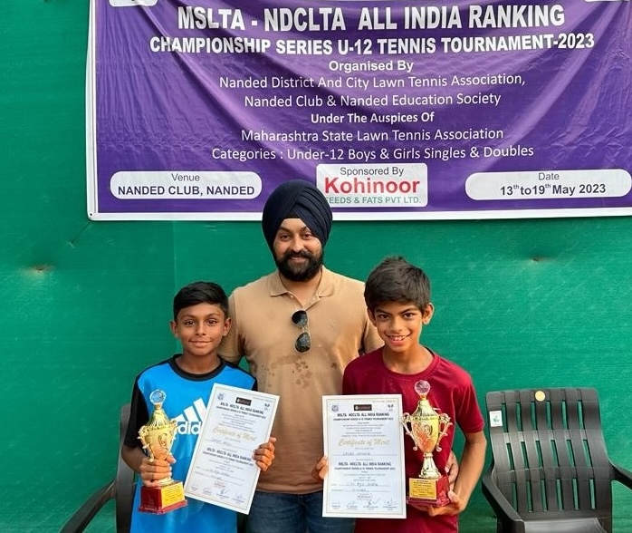 Sparsh collecting trophy for winning in the Singles category at the Under 12 Pronext Sports Academy Championship